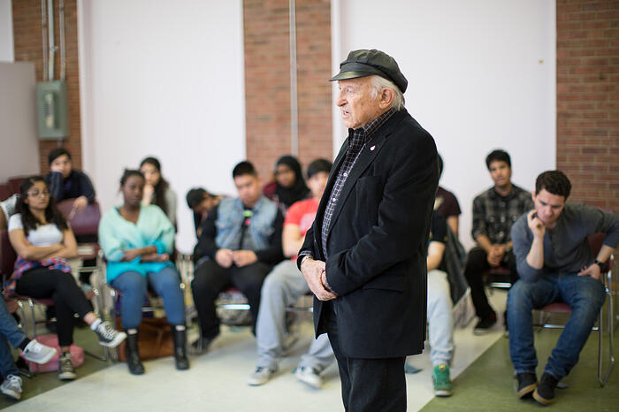 Holocaust survivor Nate Leipciger giving his testimony to students.   Photo credit Nick Kozak