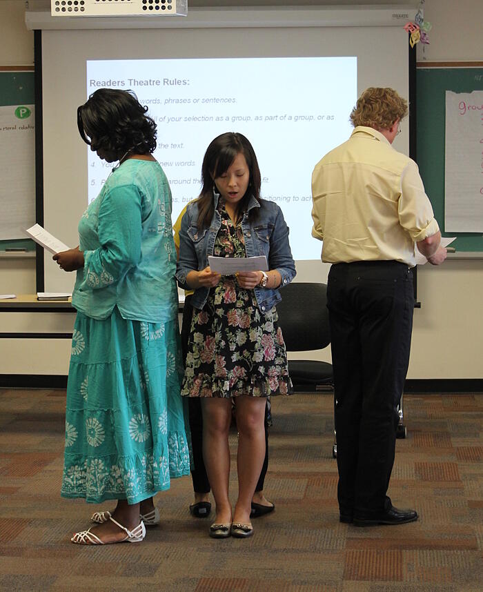 Educators at a Facing History and Ourselves seminar performing a Reader's Theatre piece
