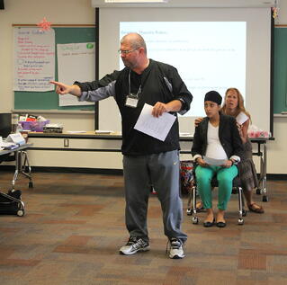 Educators at a Facing History seminar try Reader's Theatre for themselves.