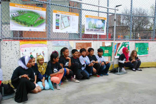 4th grade students at Nelson Mandela Park Public School present their drawings of the new Regent Park.  Photo originally posted on May 15, 2014 Toronto Star blog "Phase 3 of Regent Park Revitalization in the Works!"